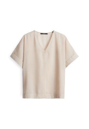 Light beige short-sleeve top with a V-neck, made from smooth fabric. Features a relaxed fit and subtle side seam detailing.