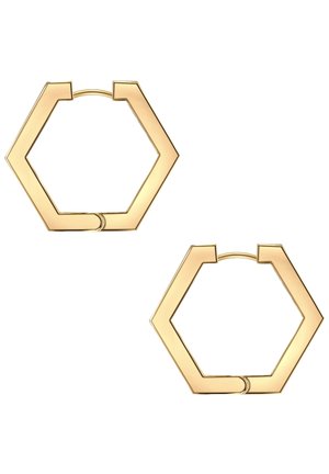 Goldene hexagonale Creolen mit einem kühnen, geometrischen Design. Glatte Oberfläche, sicherer Verschluss und offenes Zentrum betonen die strukturelle Anziehung.
