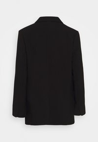 Blazer noir à manches longues avec col, vu de dos sur fond blanc.