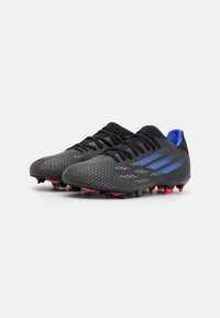 adidas Performance Jalkapallokengät kiinteälle alustalle - black