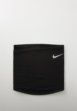 Must mustriba musternakkelus, millel on ribblik tekstuur, ja parempoolses servas on väike valge Nike'i swooshi logo. Sujuv ja sobiv disain.