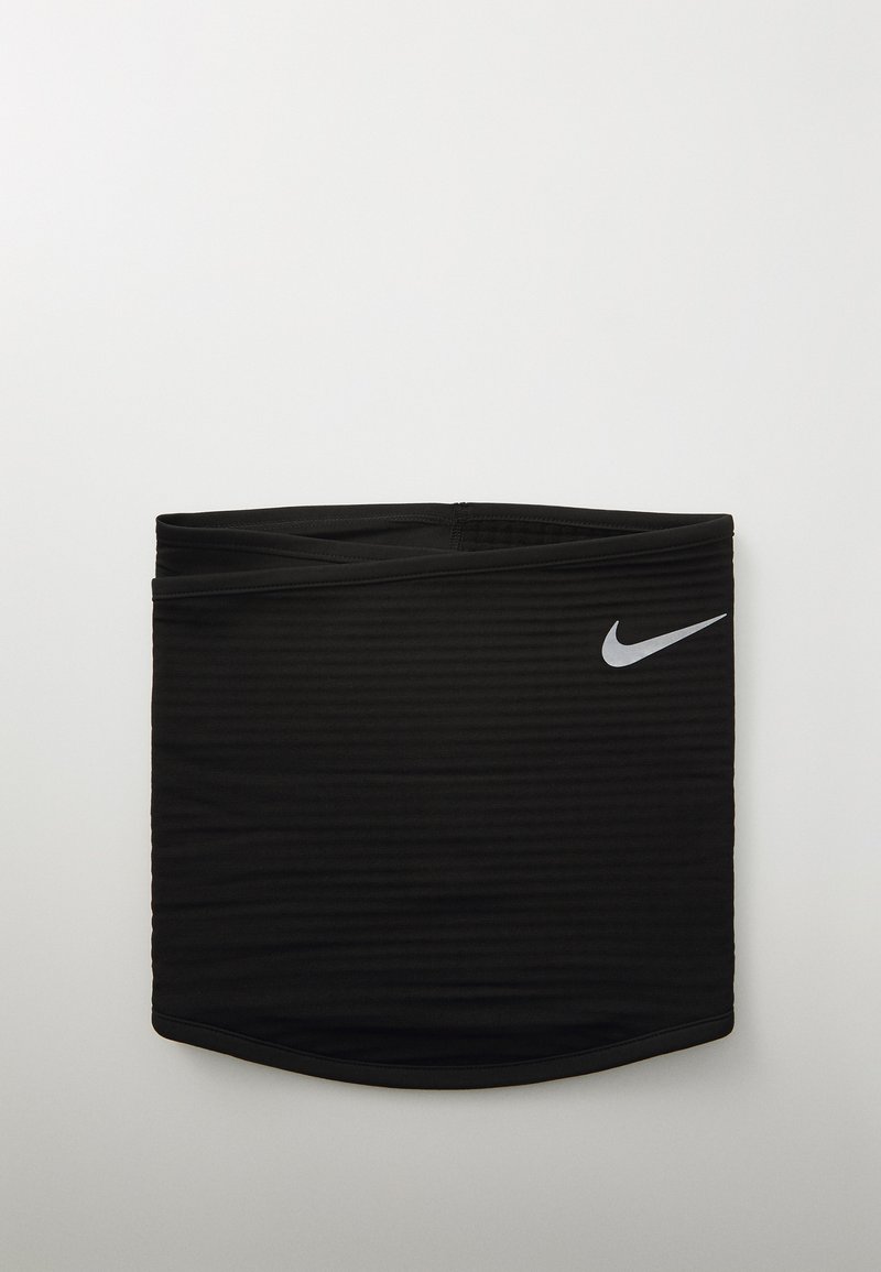 Ceinture noire de sport avec texture côtelée, arborant un petit logo Nike swoosh blanc sur le côté droit. Design lisse et ajusté.