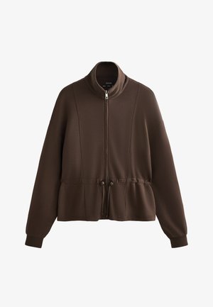 Braune Jacke mit Reißverschluss und hohem Kragen, elastischem Bund, langen Ärmeln und weicher Textur. Verfügt über einen Zugschneider an der Taille und Nahtdetails.