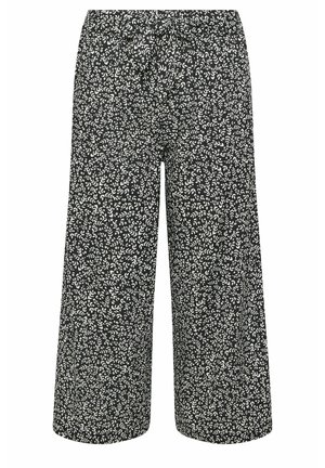 Pantalon noir à jambes larges avec petit motif de feuilles blanches et taille élastique.