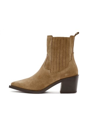 Brown suede ankle boot with pointed toe, vertical seam detailing on shaft, and a sturdy block heel. Features a pull tab for easy wear.
