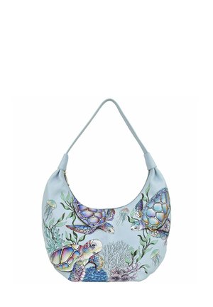 Light blue shoulder bag made of smooth material, featuring colorful turtle and jellyfish patterns, with a curved shape and single strap.