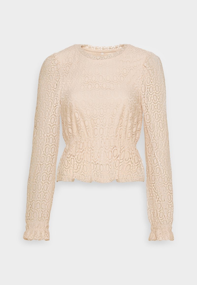 Cremfarbener langärmeliger Oberteil mit gewelltem Saum, strukturiertem Spitzendesign mit kreisförmigen Mustern und einer taillierten Passform für einen Peplum-Stil.