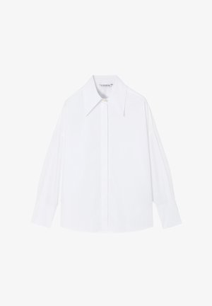 Fehér, hosszú ujjú ing, sima anyagból készült. Nagy gallérral, gombos záródással és laza szabású széles ujjakkal rendelkezik.