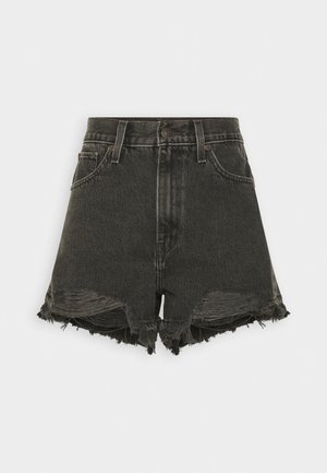 Musthave mustad teksased lühikesed püksid, millel on narmastega servad, kõrge vöökoht, viis taskut ja nööbilukk. Kulunud tekstuur lisab visuaalset huvi.