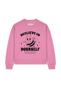 Roze sweatshirt met een cartoonbij en de tekst "BEEIVE IN YOURSELF" met de slogan "NIEMAND GAAT HET VOOR JE DOEN." Lange mouwen, ronde hals.