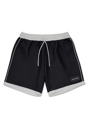 Shorts légers noirs avec une taille élastique, un cordon blanc, des poches latérales et un passepoil blanc contrastant le long de l'ourlet et des côtés.