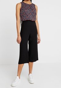 Vero Moda Housut - black