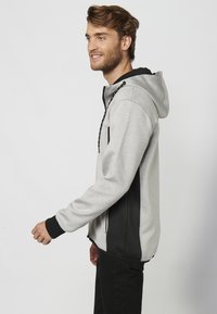 Koroshi Užtrauktuku užsegamas treningas - gris claro vigoré   light grey vigoré