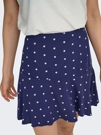 Gonna blu navy a pois con design svasato, realizzata in tessuto leggero, con pois bianchi e una cintura liscia.