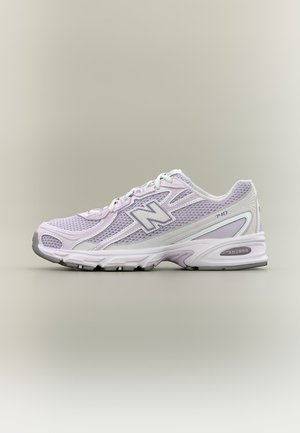 Light purple and white New Balance running shoe with mesh upper and cushioned sole, viewed from the side on a neutral gray background.