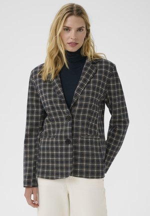 Plaid blazer with a structured design, navy and cream color scheme, two buttons, and side pockets. Textured fabric with a tailored fit.