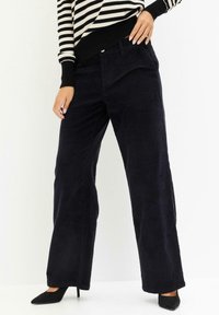 bonprix Pantaloni - black