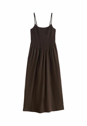 Brūna, bez piedurknēm kleita ar plānām lencītēm; sasietota vidukļa daļa un plūstoša svārku daļa; mīksts audums, ceļa garuma; vienkāršs, neskaistināts dizains.