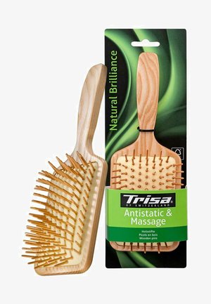 Spazzola per capelli in legno con forma rettangolare, colore legno naturale e punte in legno arrotondate. Confezionata con un'etichetta verde e nera.