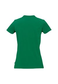 Polo shirt vert à manches courtes en coton lisse. Il présente un col classique et une étiquette sur le côté, avec une coupe ajustée et des lignes épurées.
