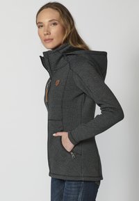 Koroshi Vetoketjullinen college - black