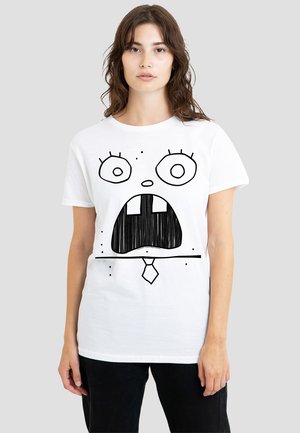 White cotton T-shirt featuring a large black cartoon face with wide eyes and an open mouth, detailed with a tie illustration underneath.
