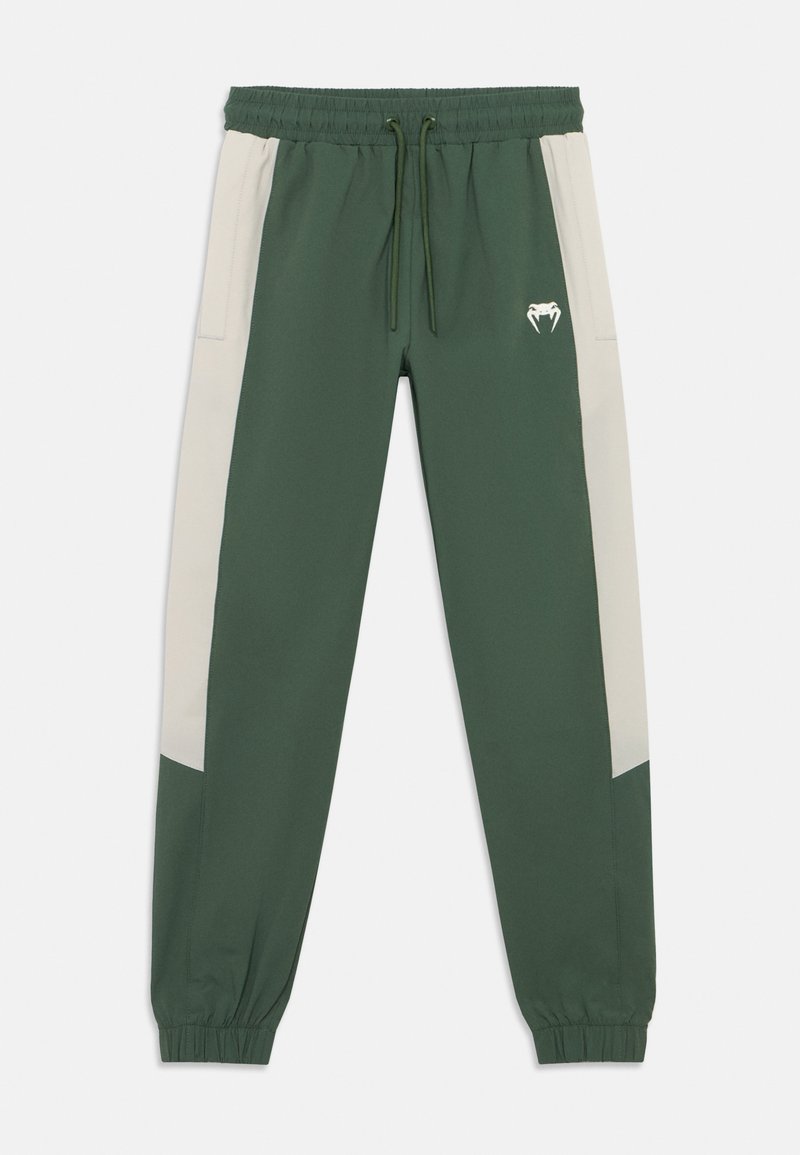 Πράσινο παντελόνι φόρμας με κρεμ πλαϊνές φάσες, ελαστική μέση, κορδόνι και ριμπ μανσέτες· διαθέτει μικρό λευκό λογότυπο στο μπροστινό μέρος.