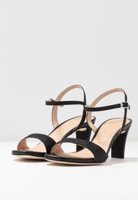 Unisa Korolliset sandaalit - black