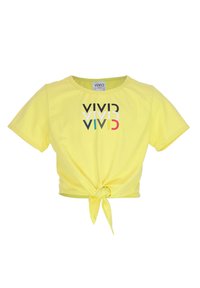 T-shirt cropped gialla in morbido tessuto, con un fronte annodato. Testo esposto "VIVID" in diversi colori: nero, bianco, blu e rosso.
