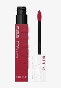Maybelline Superstay Matte Ink flytande läppstift, med ett rött hölje med präglad text, svart applikatorstav och vitt lock. Storlek 5,0 ml.