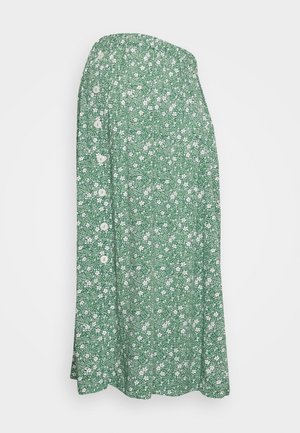 Falda midi verde con estampado floral blanco y fila lateral de botones blancos, mostrada sobre un fondo liso.