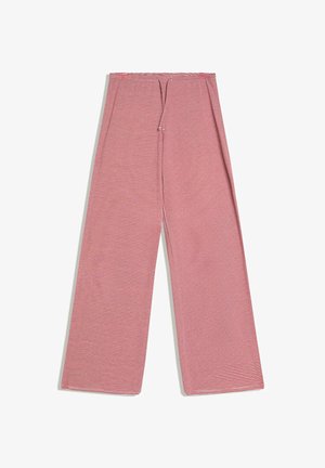 Kalhoty s širokými nohavicemi s úzkými horizontálními červenými a bílými pruhy, se zapínáním na přední dírku, položeny na bílém pozadí.