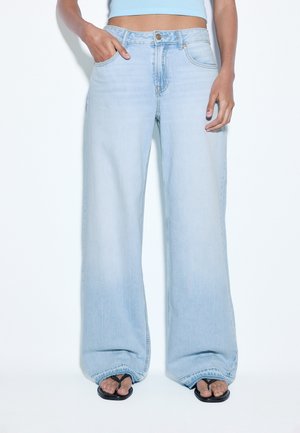 Stradivarius - Jeansy Relaxed Fit