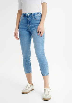 - Jeansy Skinny Fit