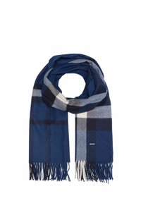 Granatowy szalik w kratę wykonany z miękkiego materiału, z naprzemiennymi niebieskimi, szarymi i białymi kwadratami. Posiada frędzelki na krawędziach, co dodaje tekstury.