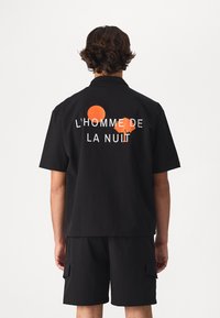 Don't Waste Culture BRYN UNISEX - Pluus - black
