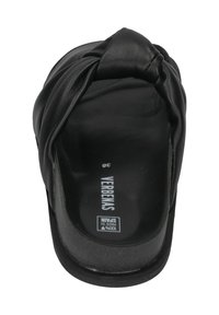 Black slide sandal with knotted strap design, made of soft material. Flat sole, labeled size 38, smooth texture, minimalistic style.