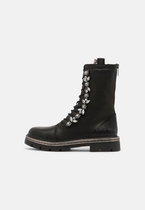 Bottines à lacets - black