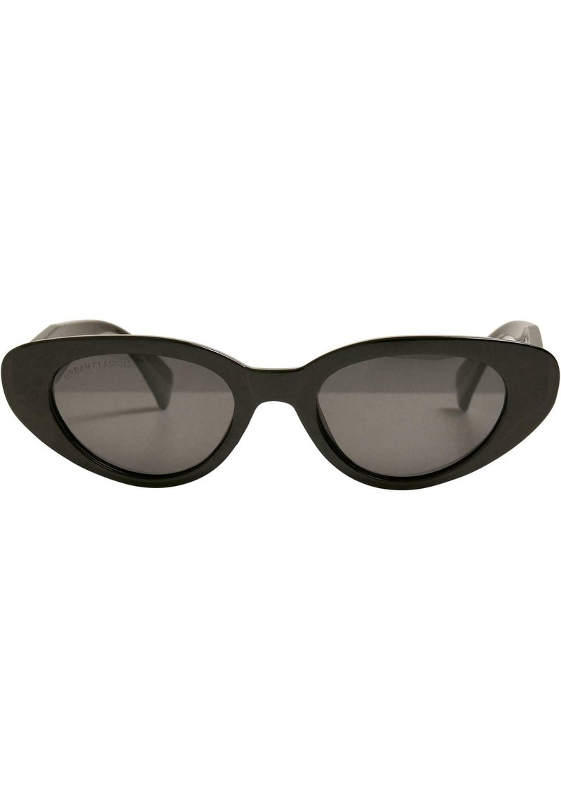 Occhiali da sole cat-eye neri con lenti scure, montatura in plastica lucida e bordi arrotondati. Design semplice senza marchi o dettagli visibili.