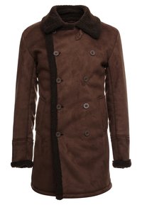 Brun dubbelknäppt kappa med en lurvig krage och manschetter, med en mjuk textur, sidofickor och sex knappstängningar framtill.