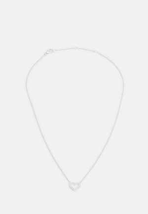 Hõbedane kett-kaelakee, millel on südamekujuline ripats, millel on õõnes keskel ja kaunistatud kivikeste äärisega toote lisadetailideks.