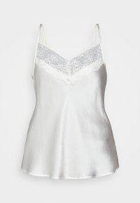 Camisole en satin blanc avec bordure en dentelle, fines bretelles réglables et petits boutons recouverts de tissu au centre de l'encolure devant.