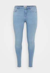 Vaqueros skinny de color azul claro hechos de denim. Presentan un diseño de cinco bolsillos, una cremallera en el fly y una sutil textura desgastada.
