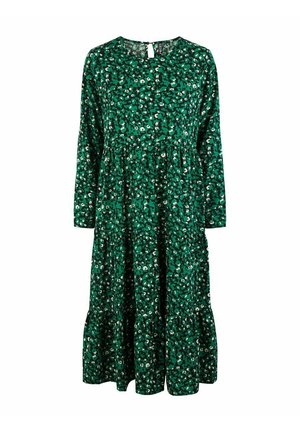 Vihreä pitkähihaisen midimekon, jossa pieniä valkoisia ja mustia kukkakuvioita, pyöreä pääntie ja kerroksellinen röyhelöhelma.