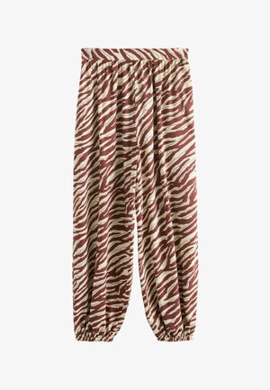 Locker sitzende Hose mit elastischem Bund und Bündchen, mit einem braunen und beigen Zebramuster.