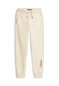 Cremefarbene Sweatpants mit geribbeltem Bund und Bündchen, ausgestattet mit einem Kordelzug und einem roten "TOMMY HILFIGER"-Logo auf der linken Seite.