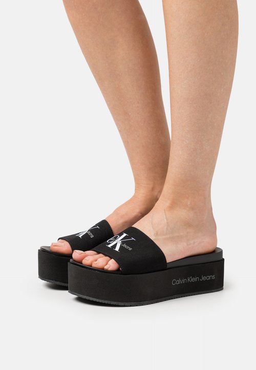 CD ALIDAS CROSS SANDAL BLACK GRAINED CALFSKIN