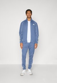 adidas Sportswear STADIUM SET - Træningssæt - preloved ink/off white
