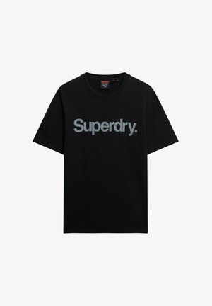 Camiseta de algodón negra de manga corta, con un destacado logo en gris "Superdry." en el pecho y un cuello redondo.