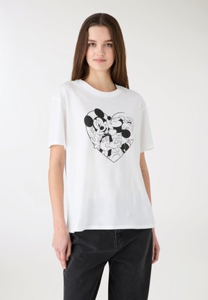 Biały bawełniany T-shirt z czarną grafiką postaci z kreskówek w kształcie serca. Luźny krój, krótkie rękawy, okrągły dekolt.